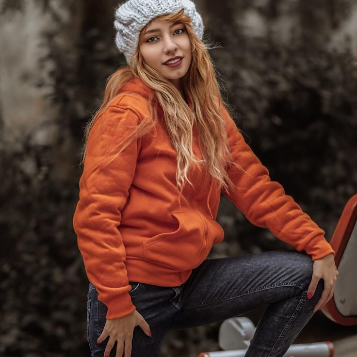 Ava Singh, Lead Design Curator at Moonlit Harbor Group, reviewing corporate floral arrangements